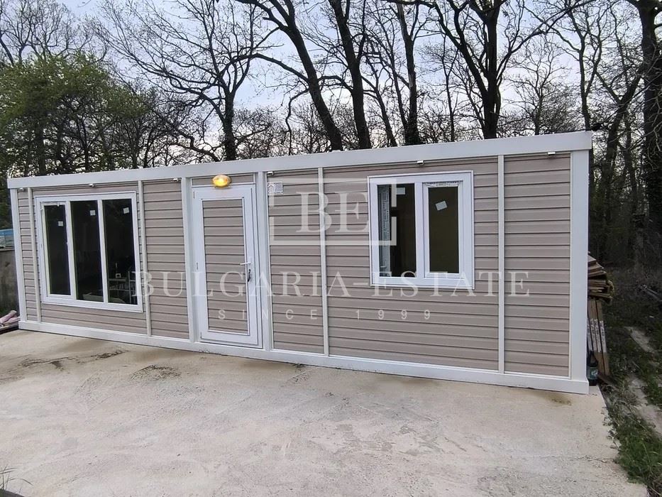 Парцел 570 кв.м. на асфалтов път с ток, вода, контейнерна къща и гора - 0